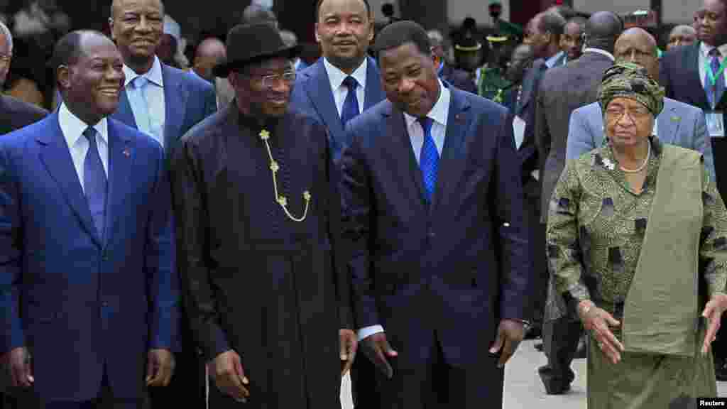 Ivory Coast's President Alassane Ouattara (L), Nigeria's President Goodluck Jonathan (2nd L), Benin's President Thomas Yayi Boni and Liberia President Ellen Johnson Sirleaf (R) are pictured at the 43rd ECOWAS meeting in Abuja.