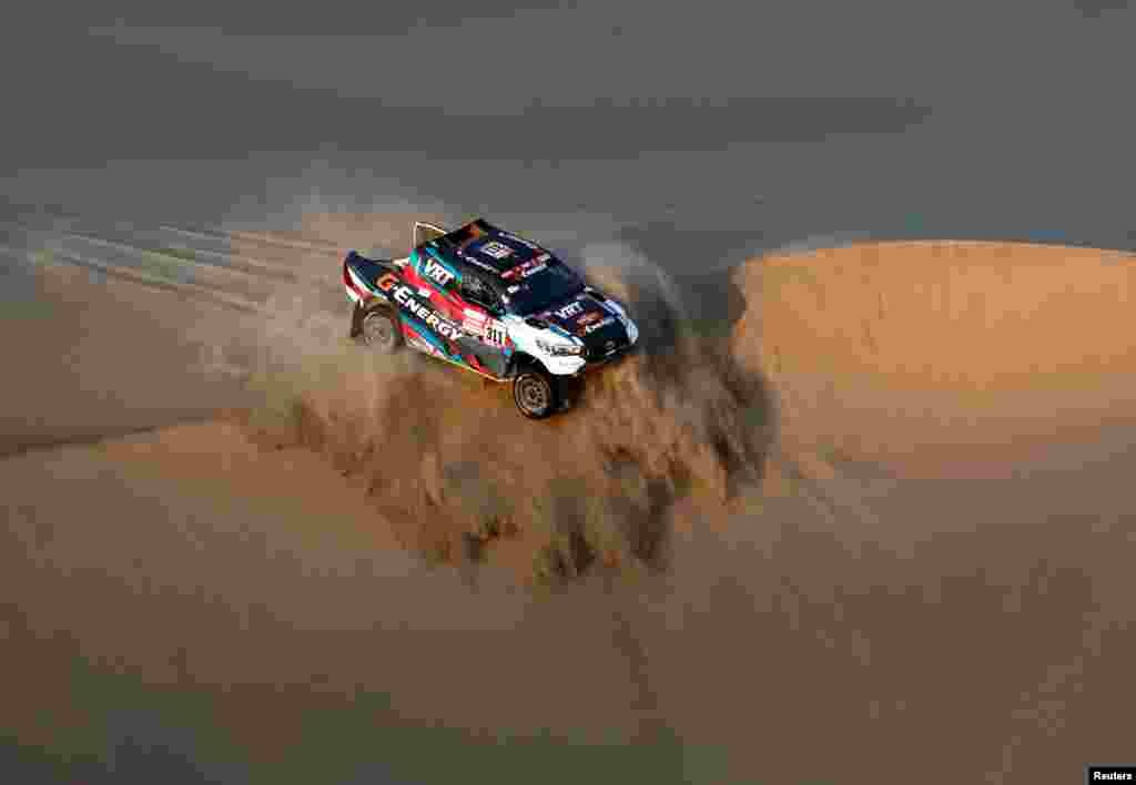 G-Energy's driver Vladimir Vasilyev and co-driver Konstantin Zhiltsov race during the 2nd stage of the Dakar Rally between Pisco and San Juan de Marcona, Peru, Jan. 7, 2019.