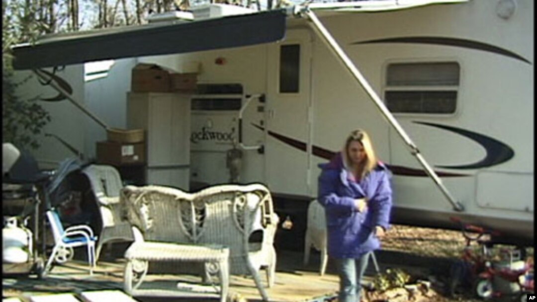Tammy Renault, her husband and four of their five sons now live in a donated travel-trailer.