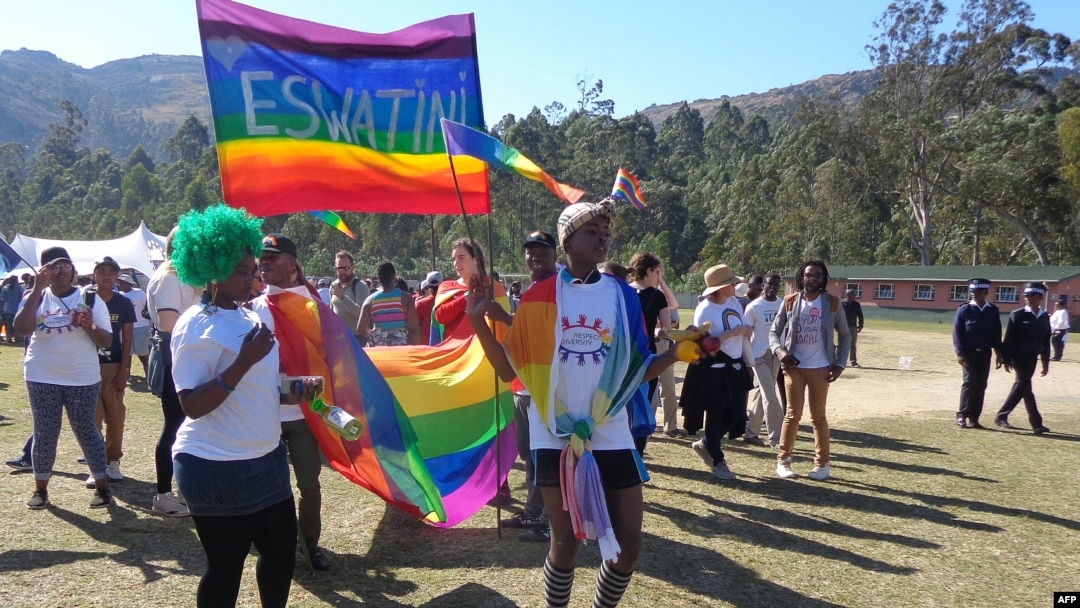 FILE - People take part in Eswatini's first gay pride demonstration in Mbabane, June 30, 2018. Human rights lawyer Sibusiso Nhlabatsi says the harsh legal environment for LGBTQ people in the kingdom causes significant problems for them. 