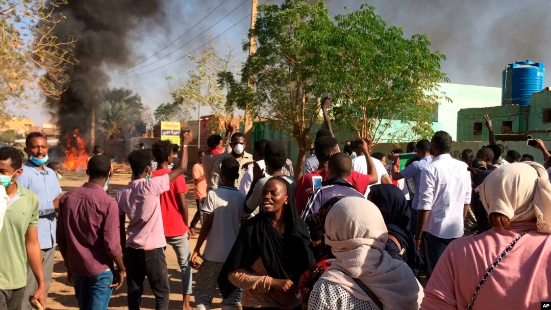 Anti-government protesters rally in Khartoum, Sudan, Sunday, Jan. 13, 2019.