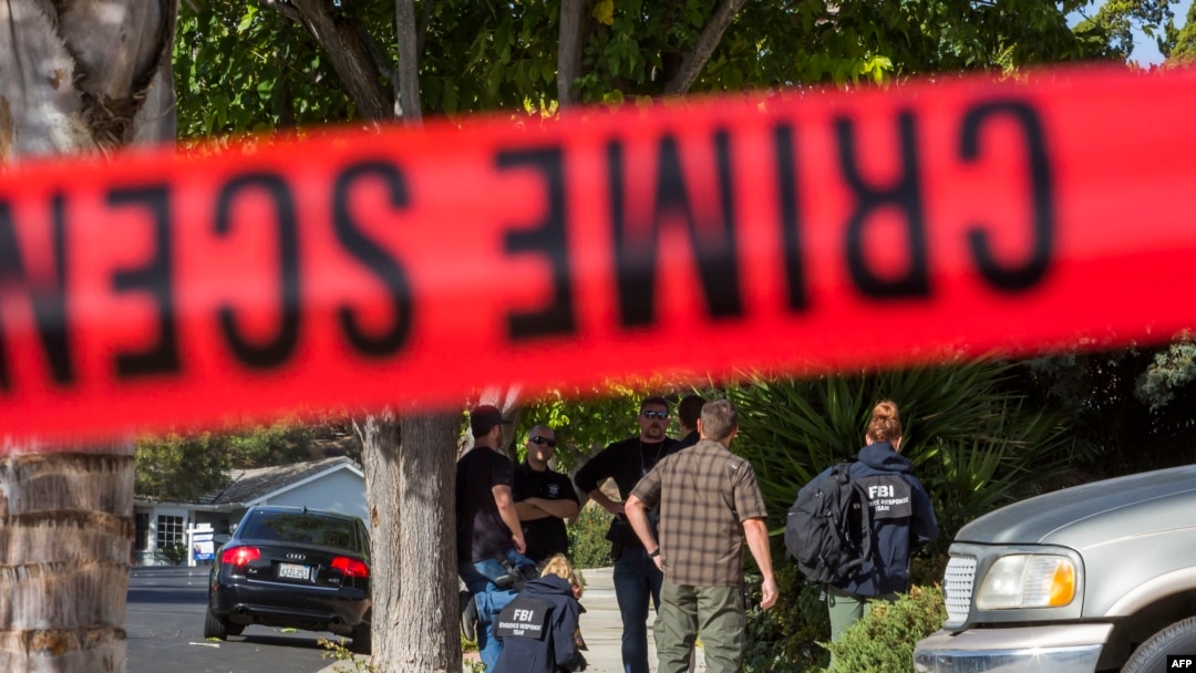FBI agents collect evidence at the home of suspected nightclub shooter Ian David Long in Thousand Oaks, Calif., Nov. 8, 2018.