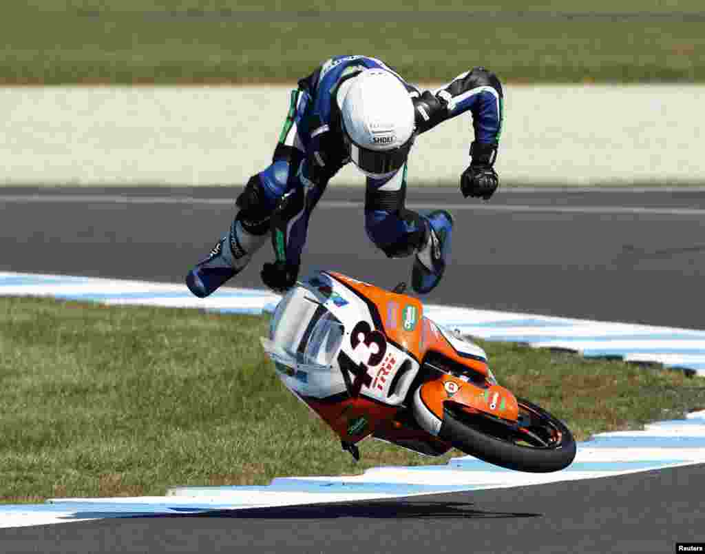 Kiefer Racing Moto3 rider Luca Grunwald of Germany crashes during a free practice session ahead of the Australian Motorcycle Grand Prix, at Phillip Island Circuit.