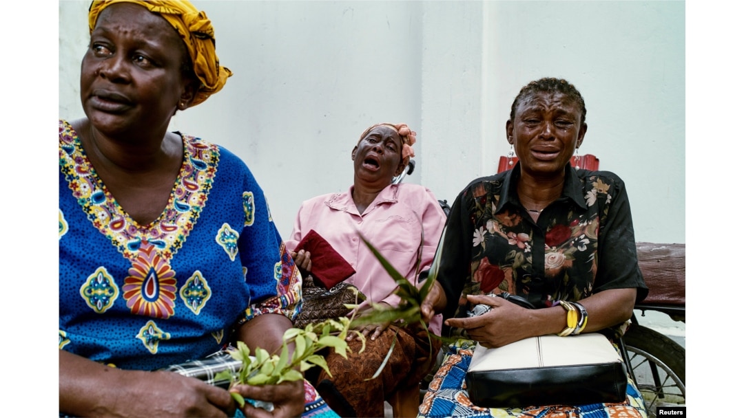 Women who supported Congolese opposition leader Étienne Tshisekedi mourn his death outside his residence in the Democratic Republic of Congo’s capital, Kinshasa, Feb. 2, 2017.