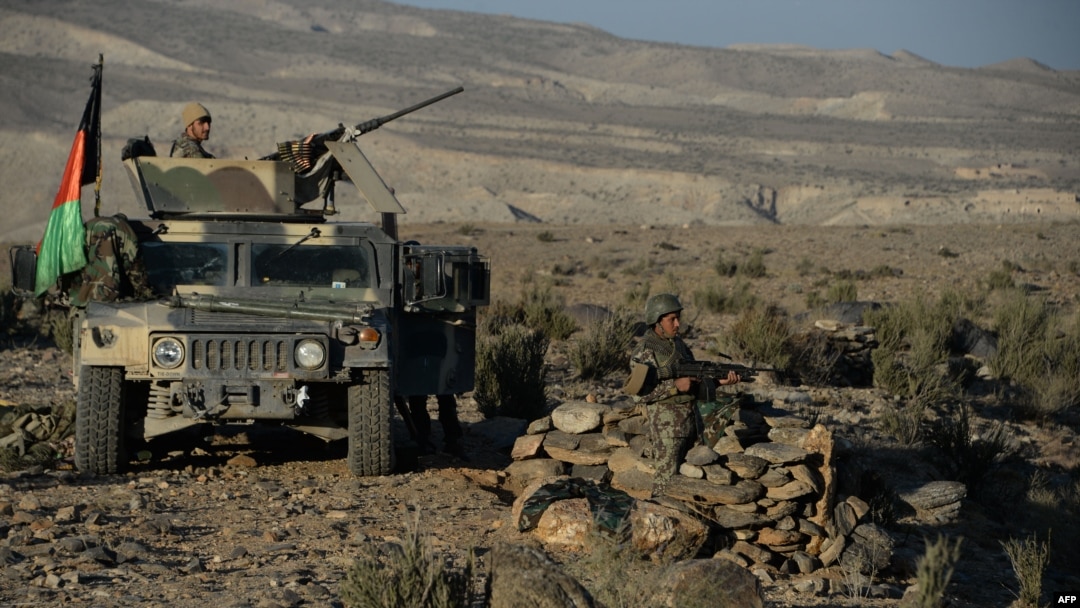 Afghan security forces take positions following an operation against Islamic State militants in the Pachir Agam district of Nangarhar province, Dec. 3, 2016. 