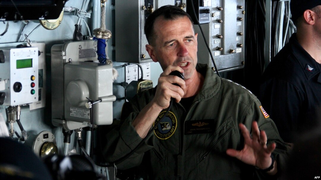 U.S. Chief of Naval Operations Admiral John Richardson addresses all crew from the bridge of the USS George H.W. Bush as it conducted joint training operations with the French navy off Virginia, May 14, 2018.