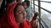 Shilpi, a cousin of late Bangladeshi blogger Washiqur Rahman Babu, wails outside a morgue at the Dhaka Medical College in Dhaka, Bangladesh, March 30, 2015.