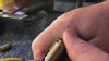 Loading a pistol magazine