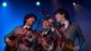 A Beatles tribute band plays at the dilapidated Washington Coliseum on the 50th anniversary of The Beatles' first North American performance at the venue in Washington, Feb. 11, 2014.