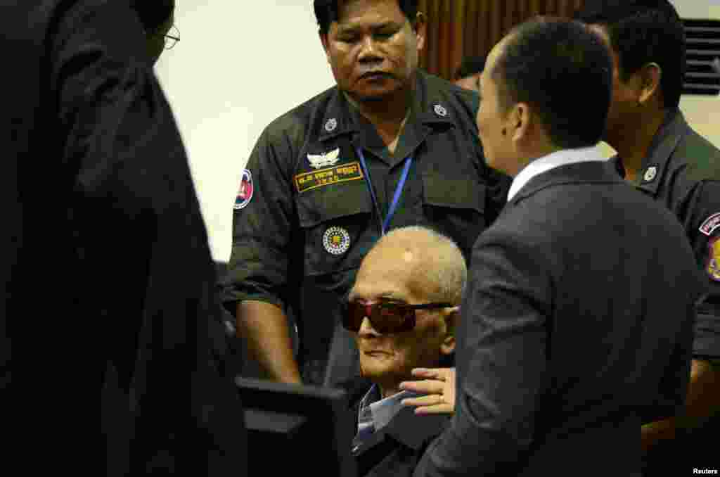 Former Khmer Rouge leader 'Brother Number Two' Nuon Chea sits inside the courtroom of the Extraordinary Chambers in the Courts of Cambodia (ECCC) as he awaits a verdict, on the outskirts of Phnom Penh, Cambodia.