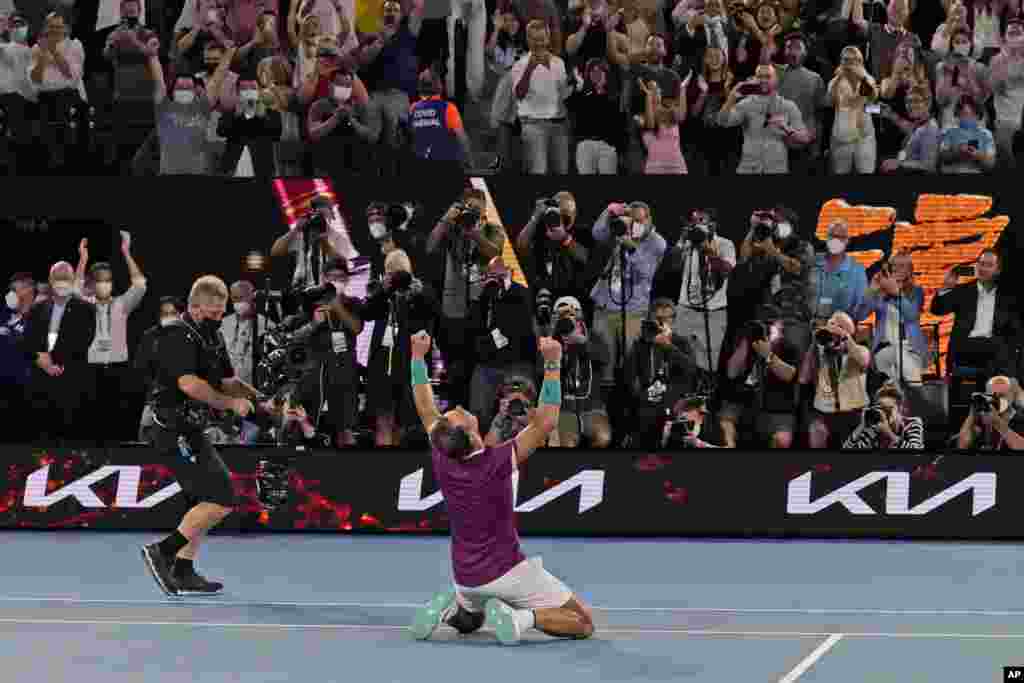Rafael Nadal of Spain celebrates after defeating Daniil Medvedev of Russia during the men's singles final at the Australian Open tennis championships in Melbourne, Australia.