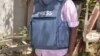 FILE - In this photo taken March 22, 2014, a Somali journalist is seen in Mogadishu, Somalia.