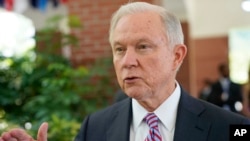 FILE - U.S. Attorney General Jeff Sessions is interviewed by The Associated Press at the U.S. Embassy in San Salvador, El Salvador, July 27, 2017. 
