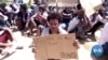 Migrants in Libya: Homeless, Detained But Determined
