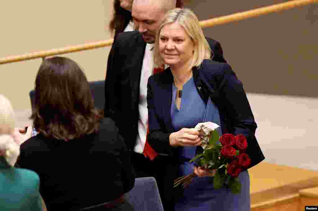 Current Finance Minister and Social Democrat leader Magdalena Andersson is congratulated after being appointed as the country's new prime minister following a voting at the Swedish Parliament Riksdagen in Stockholm. Hours after being tapped as Sweden’s first female prime minister, though, Andersson resigned after suffering a budget defeat in parliament.
