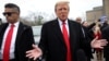 FILE — Former U.S. President and Republican presidential candidate Donald Trump speaks while visiting a polling station in Londonderry, New Hampshire, during the New Hampshire presidential primary, Jan. 23, 2024. 