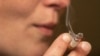 FILE - Authors of a new study found that people with schizophrenia started smoking at a younger age than other smokers, before psychotic symptoms appeared.
