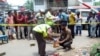 Bangladesh forensics police investigate the site where blogger Ananta Bijoy Das was hacked to death, in Sylhet on May 12, 2015. 