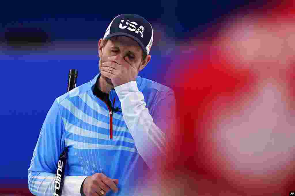 United States' John Shuster reacts after a bad throw during the men's curling bronze medal match between Canada and the United States at the Beijing Winter Olympics in Beijing.