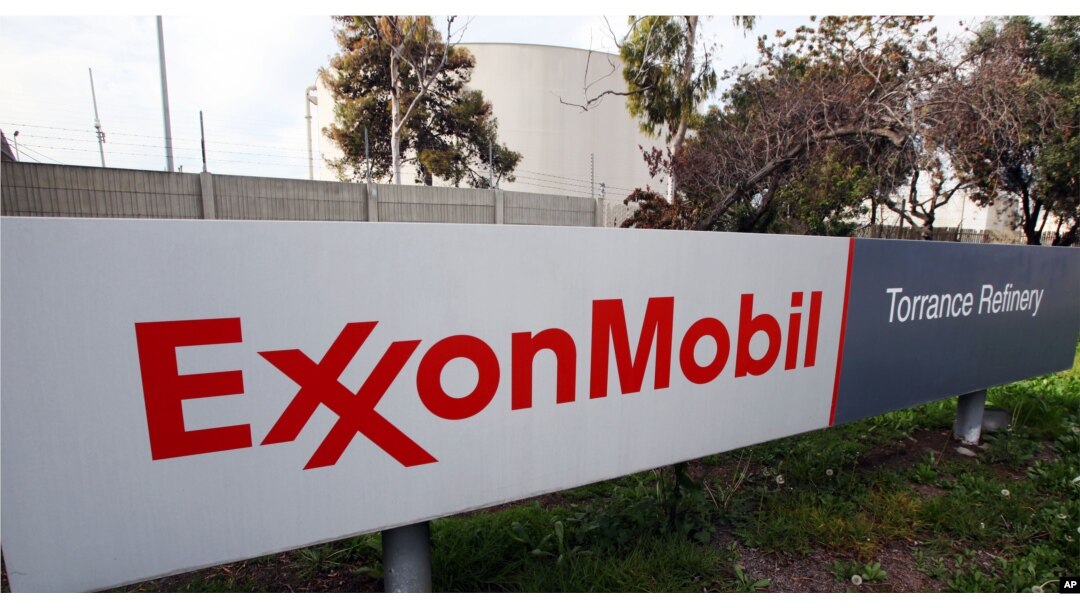 FILE - A sign for the ExxonMobil Torerance Refinery in Torrance, California, Jan. 30, 2012
