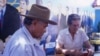 The games of dominoes that old men play in Maximo Gomez Park are straight out of Havana.