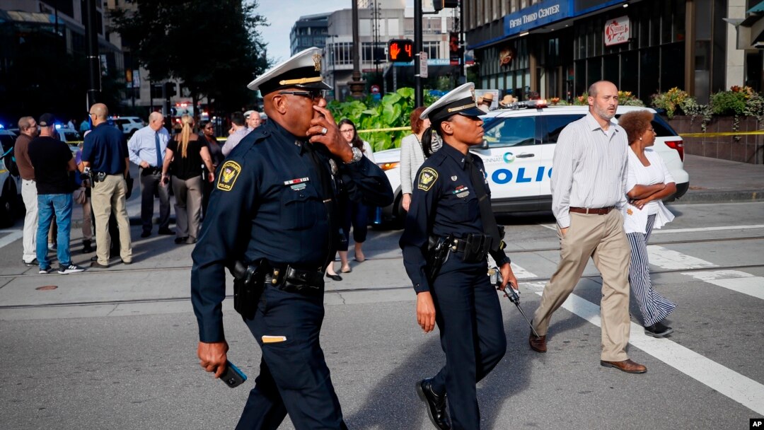 Emergency personnel and police respond to a reported active shooter situation near Fountain Square, Sept. 6, 2018, in downtown Cincinnati, Ohio. 