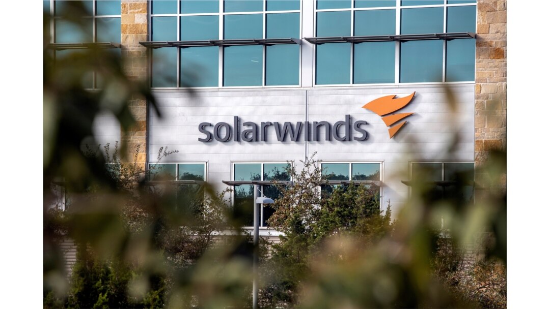 FILE - The SolarWinds logo is seen outside its headquarters in Austin, Texas, Dec. 18, 2020.
