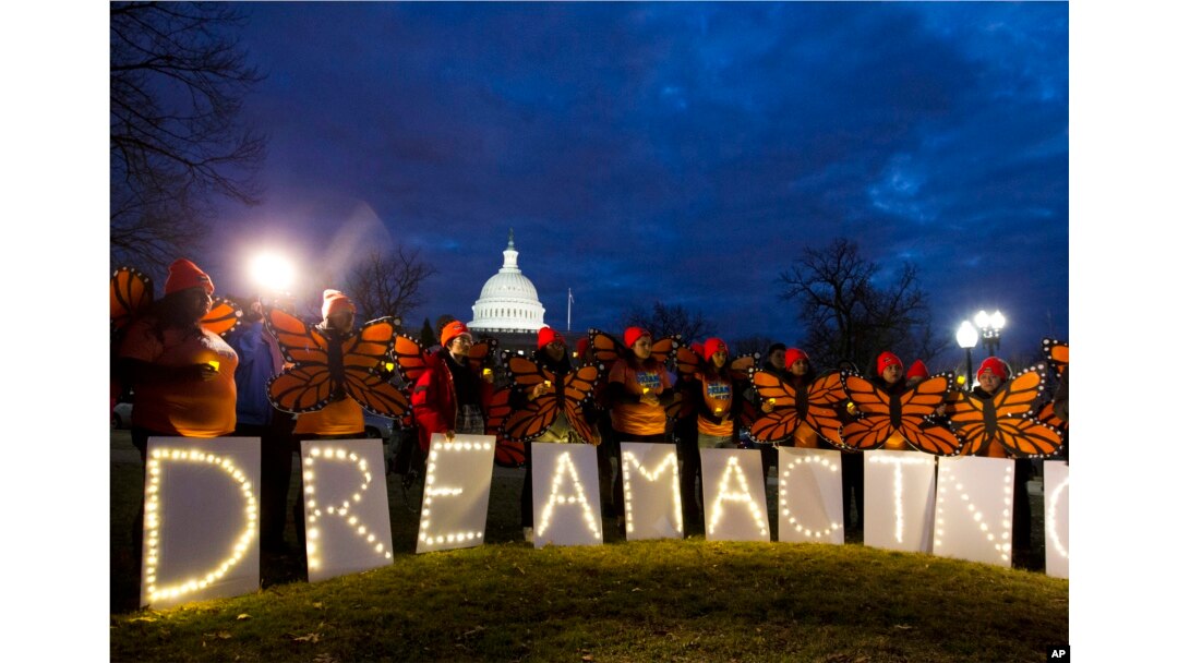 FILE - Demonstrators rally in support of Deferred Action for Childhood Arrivals (DACA) outside the Capitol, in Washington, Jan 21, 2018.