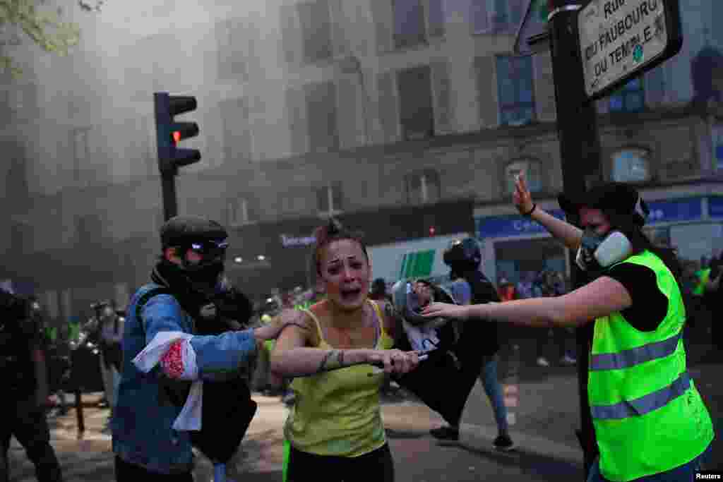 A protester reacts at a demonstration during Act XXIII (the 23rd consecutive national protest on Saturday) of the yellow vests movement in Paris, France, April 20, 2019.