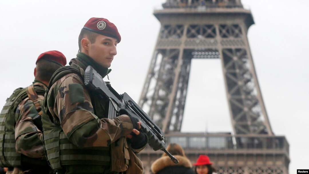 French soldiers patrol near the Eiffel Tower in Paris as part of the highest level of "Vigipirate" security plan after a shooting at the Paris offices of Charlie Hebdo, Jan. 9, 2015.