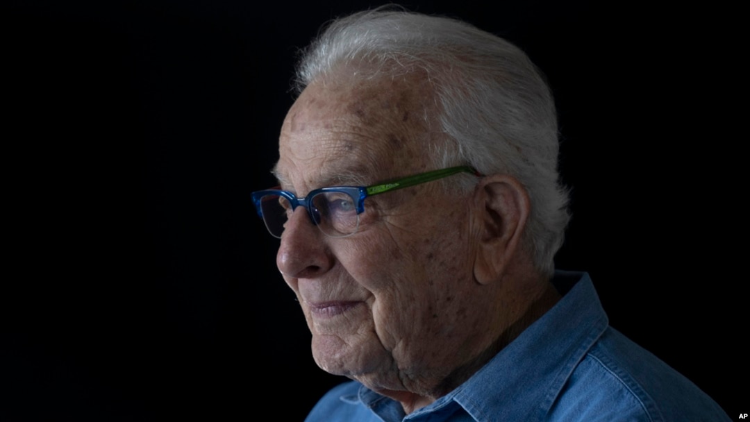 FILE - Holocaust survivor Naftali Furst pauses during an interview at home in Haifa, Israel, Jan. 14, 2025.