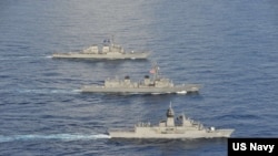 美國、日本和澳大利亞海軍10月19日在南中國海舉行今年第五次的聯合演習。（美國第七艦隊網站）