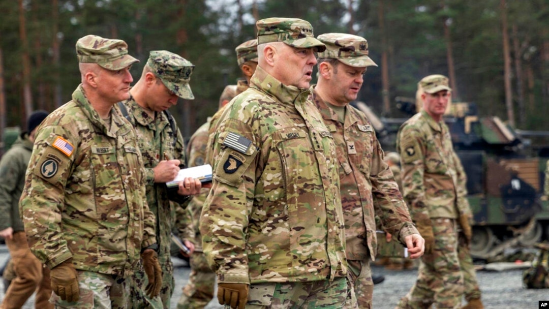 In this image provided by the U.S. Army, U.S. Chairman of the Joint Chiefs of Staff Gen. Mark Milley meets with U.S. Army leaders at Grafenwoehr Training Area, Grafenwoehr, Germany, Jan. 16, 2023. 
