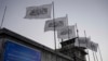 FILE - Taliban flags fly at the airport in Kabul, Afghanistan, Sept. 9, 2021. 