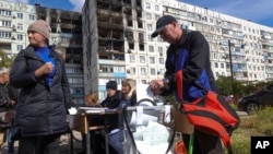 Проведение псевдореферендума в Мариуполе. Донецкая область, Украина. 