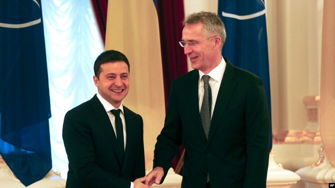 Ukrainian President Volodymyr Zelenskiy, left, welcomes NATO Secretary General Jens Stoltenberg during their meeting in Kyiv, Ukraine, Oct. 31, 2019.