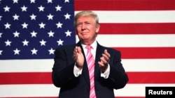 Republican presidential nominee Donald Trump speaks on stage during a campaign rally in Fredericksburg, Virginia, Aug. 20, 2016. 