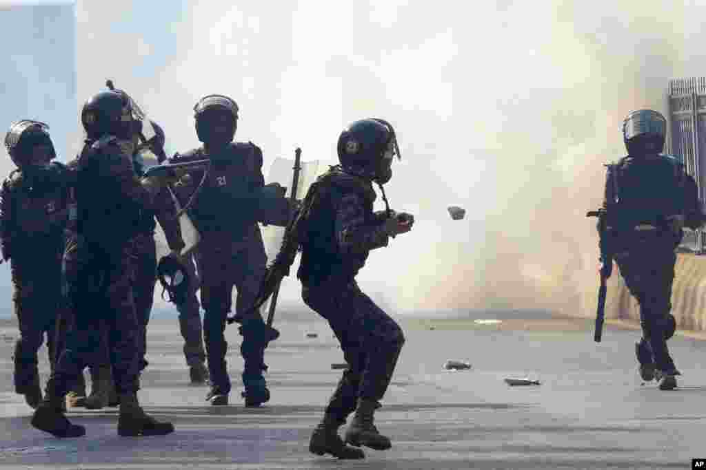 Paramilitary soldiers fire tear gas shells to disperse supporters of imprisoned former premier Imran Khan's Pakistan Tehreek-e-Insaf party, during clashes, in Islamabad, Pakistan.