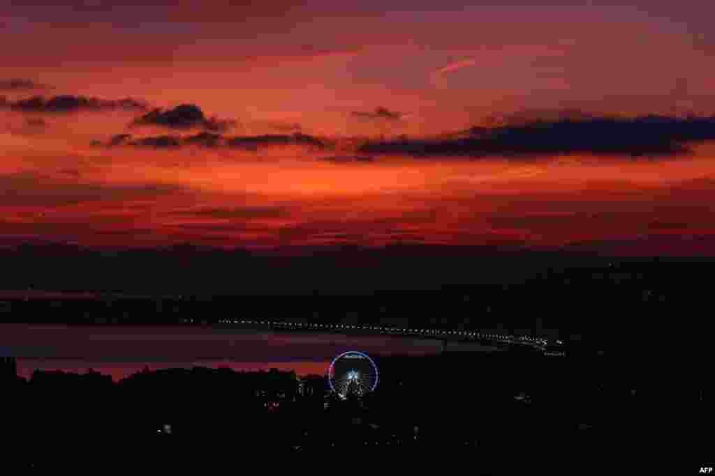 The "Baie des Anges" on the French Riviera in Nice is seen at sunset.