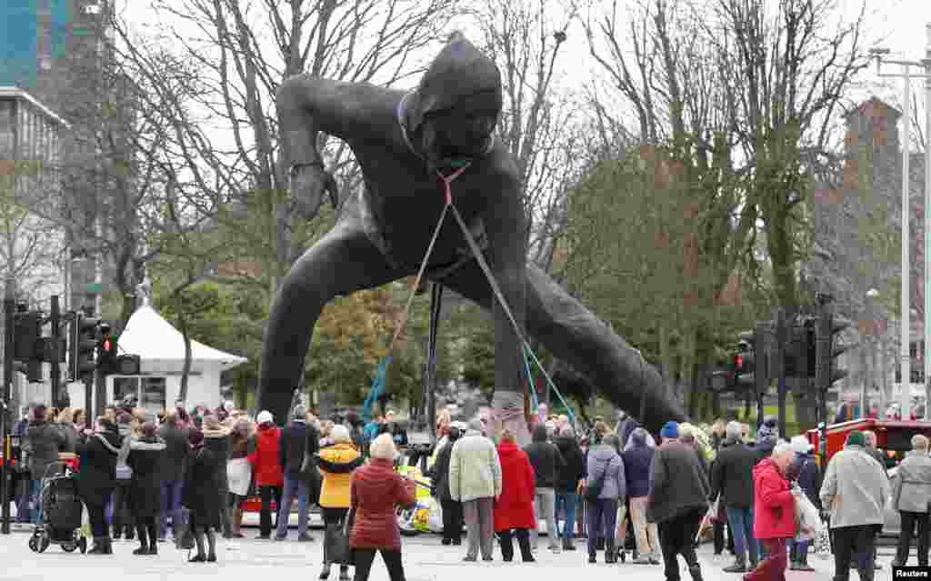 Britain's largest bronze sculpture 'Messenger' is driven to Plymouth Theatre Royal through the city center in Plymouth, Britain.