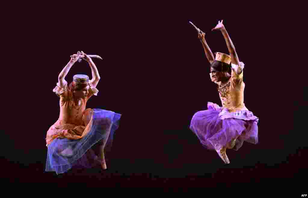 Dancers from Les Ballets Trockadero de Monte Carlo perform a scence from "Trovatiara" during a dress rehearsal before opening night at the Joyce Theater in New York.