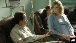 FILE - Walter White, played by Bryan Cranston, and his wife Skyler White, played by Anna Gunn, during the first season of "Breaking Bad."