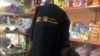 Mosul Burqa Ban Unveils Militants in Hiding