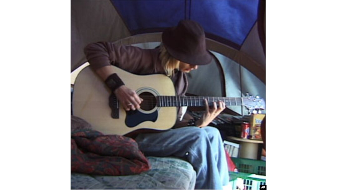 The Renaults and four of their children make do in a travel-trailer with 20 square meters of living space.