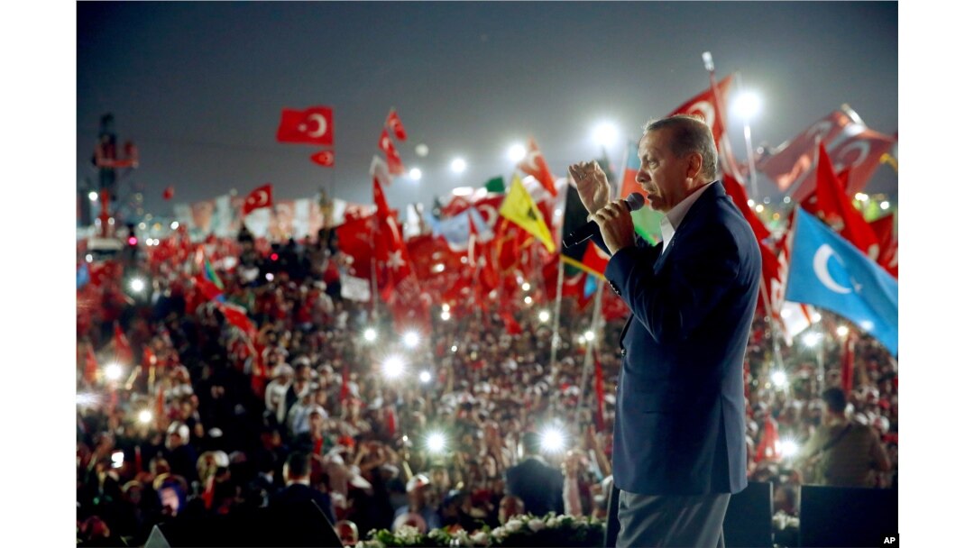 Turkish President Recep Tayyip Erdogan delivers a speech at a rally Rally in Istanbul, Aug. 7, 2016.