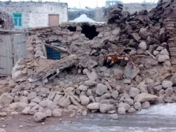 Houses are reduced to rubble after an earthquake hit villages in Baskale in Van province, Turkey, at the border with Iran, Feb. 23, 2020.