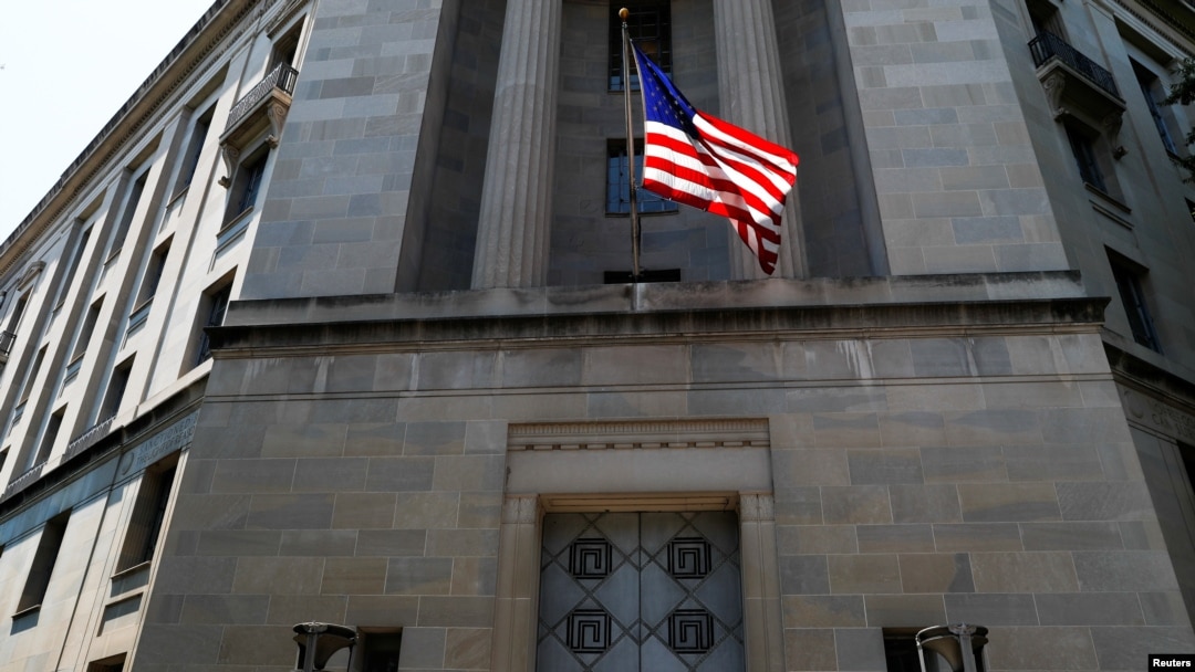 FILE - The U.S. Department of Justice headquarters building in Washington.