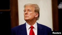 FILE - Former U.S. President Donald Trump is pictured at his Trump International Golf Club in West Palm Beach, Florida, March 24, 2024. The judge in his hush money criminal case on April 12 turned down Trump's request for a postponement because of pretrial publicity.