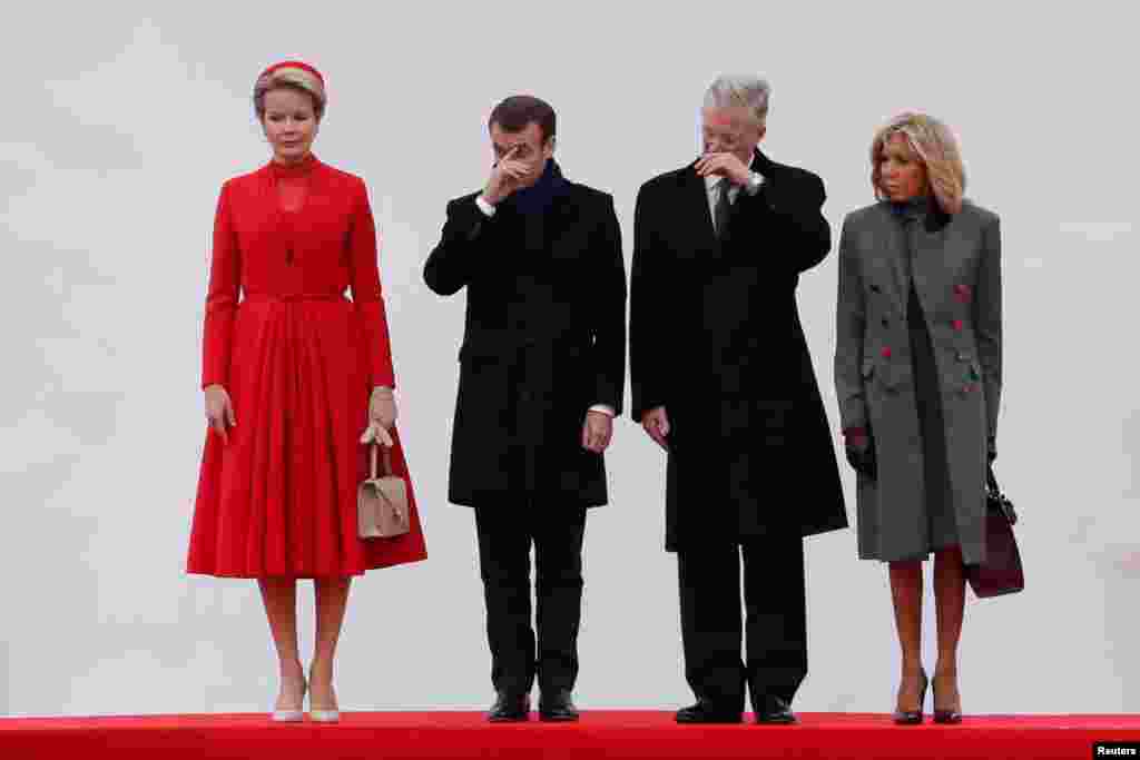 Belgian King Philippe and Queen Mathilde welcome French President Emmanuel Macron and his wife Brigitte Macron at Brussels' Royal Palace, on the first day of an official state visit, in Brussels, Belgium.