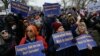 Trump administration lays off probationary employees, plans 'large-scale' cuts